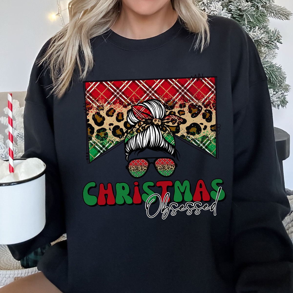CHRISTMAS OBSESSED Leopard Print Messy Bun Mom Cozy Holiday Sweatshirt in 12 Colors S-2XL