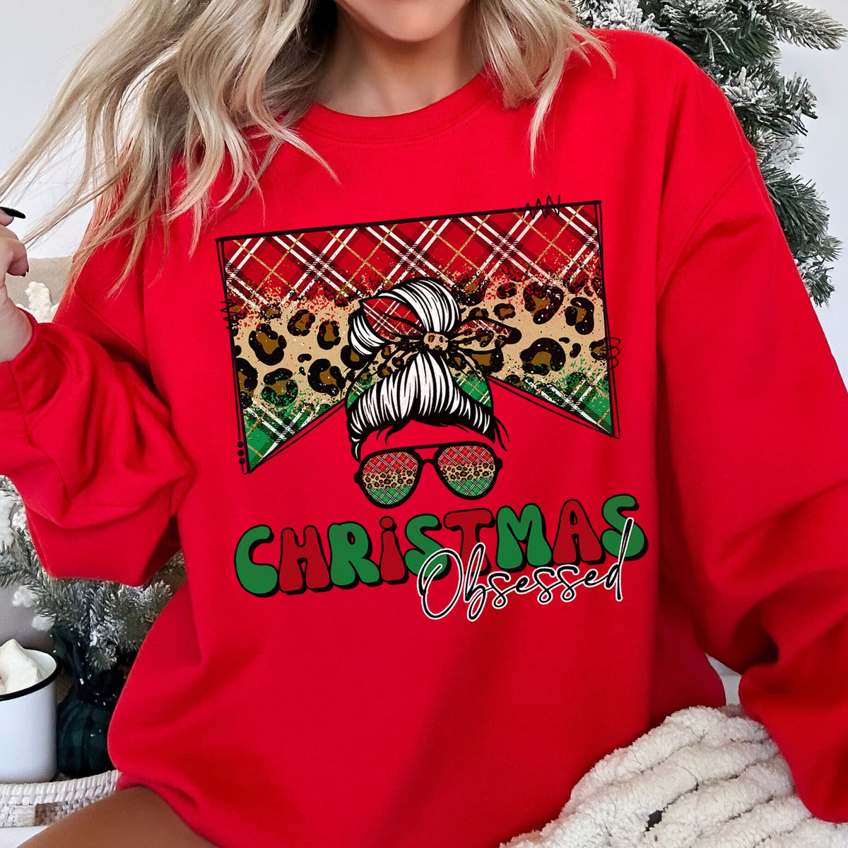 CHRISTMAS OBSESSED Leopard Print Messy Bun Mom Cozy Holiday Sweatshirt in 12 Colors S-2XL